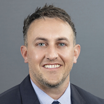 Headshot of Dustin J Jones, MD