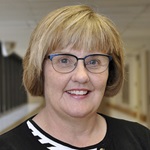 Headshot of Jane M. Grimberg, FNP